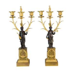 Fine Patinated and Gilt Bronze Three-Light Figural Candelabras